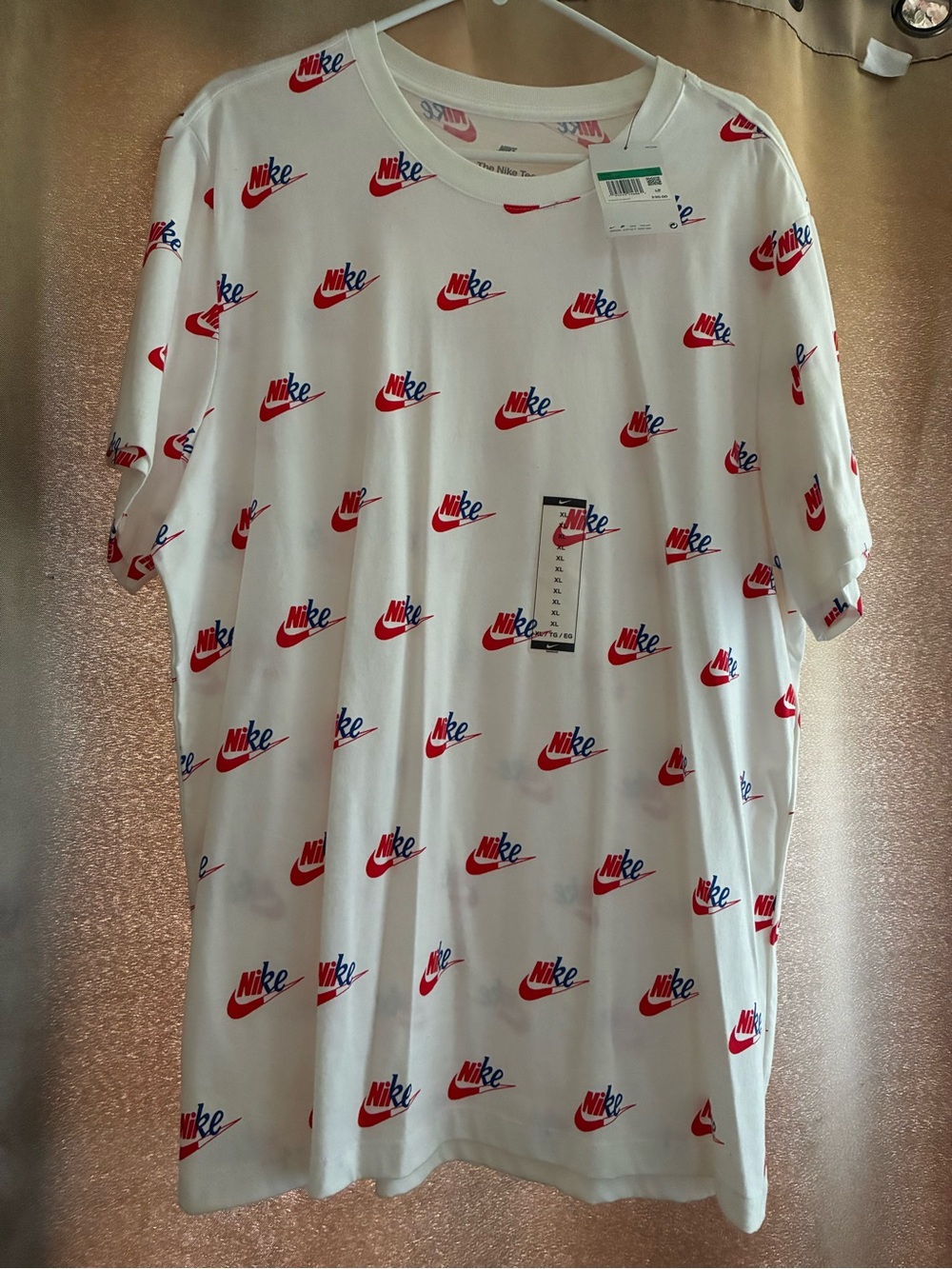 Nike White Short-Sleeve Tee with Allover Red Logo Print